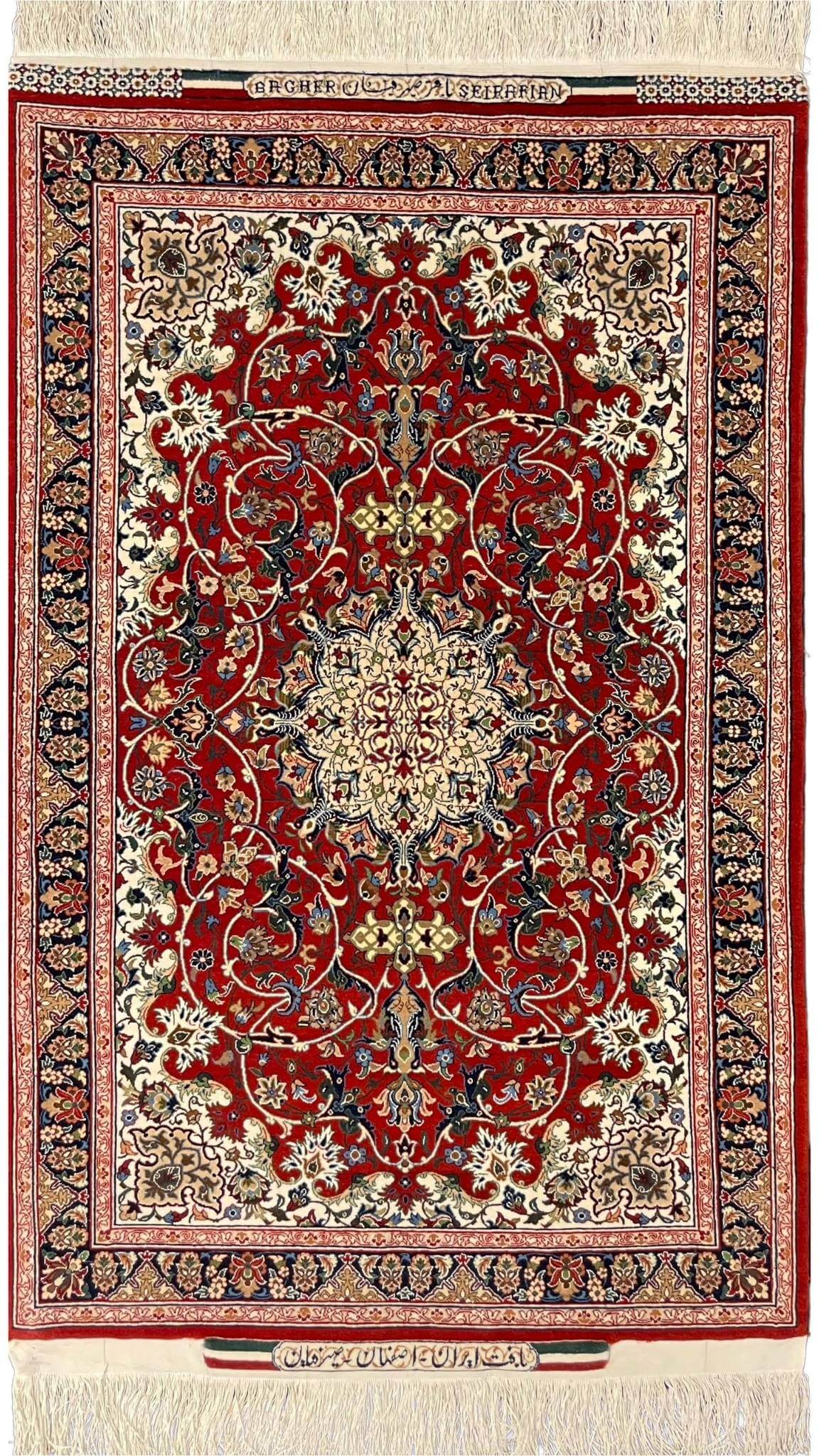 Elegant Seirafian Isfahan rug in red, cream, and navy with intricate medallion design.
